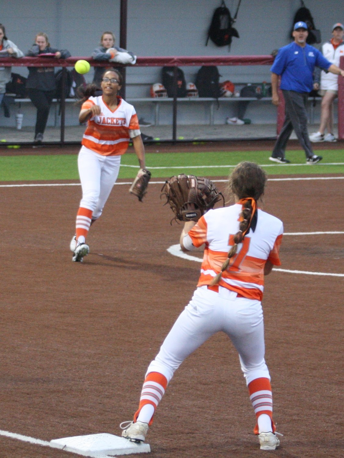 Kaitlyn Burrell and Breanna Wilmoth team up to record the first out of the sixth inning.