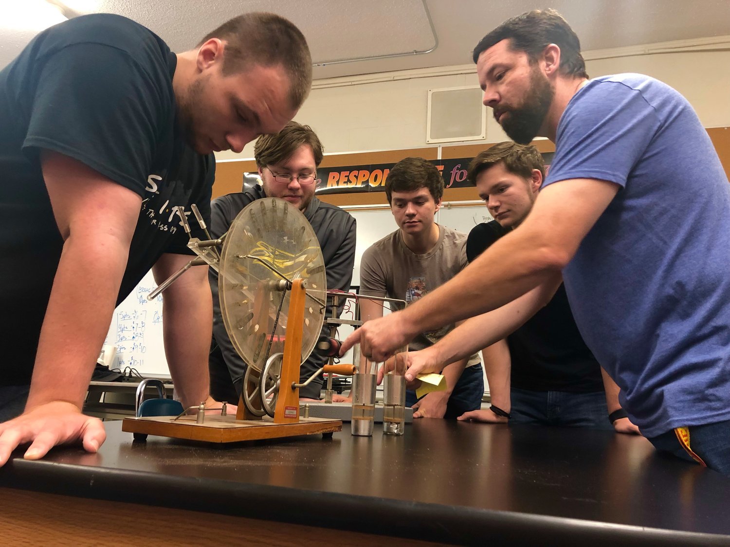 STEM practicum students work on a project with their teacher, David Cross. From left: Justin Blalock, Ashton Goss, Garrett Fields, Vincent Ogg, and Cross. See Page Four for related story and photo.