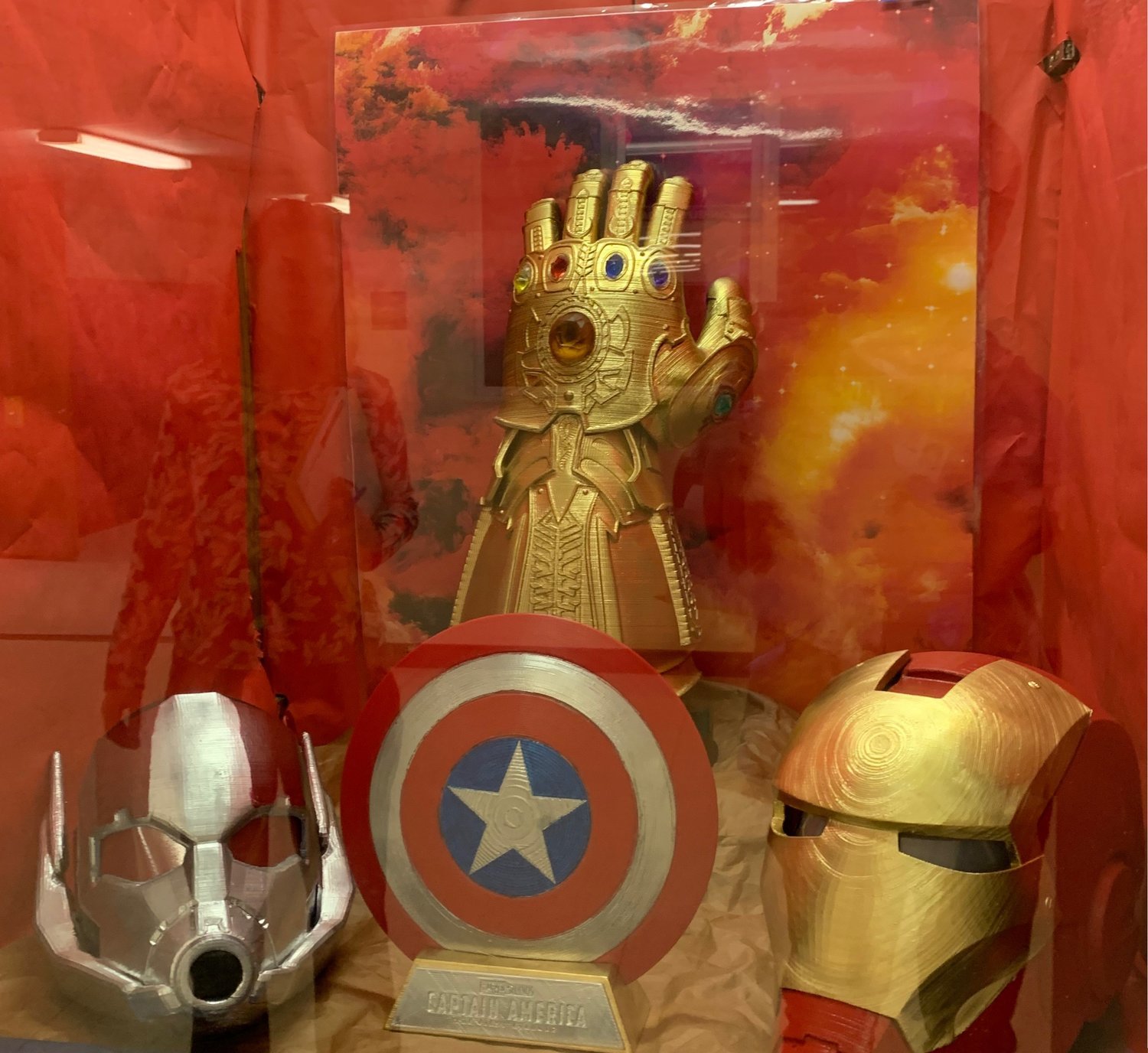Quitman High School STEM students have made various projects from 3D printed materials. On display in the library window are some of the projects (left to right): Ant Man mask, Captain American shield, Infinity Gauntlet and an Iron Man mask. The creations go along with the Avengers theme of this year’s high school yearbook.