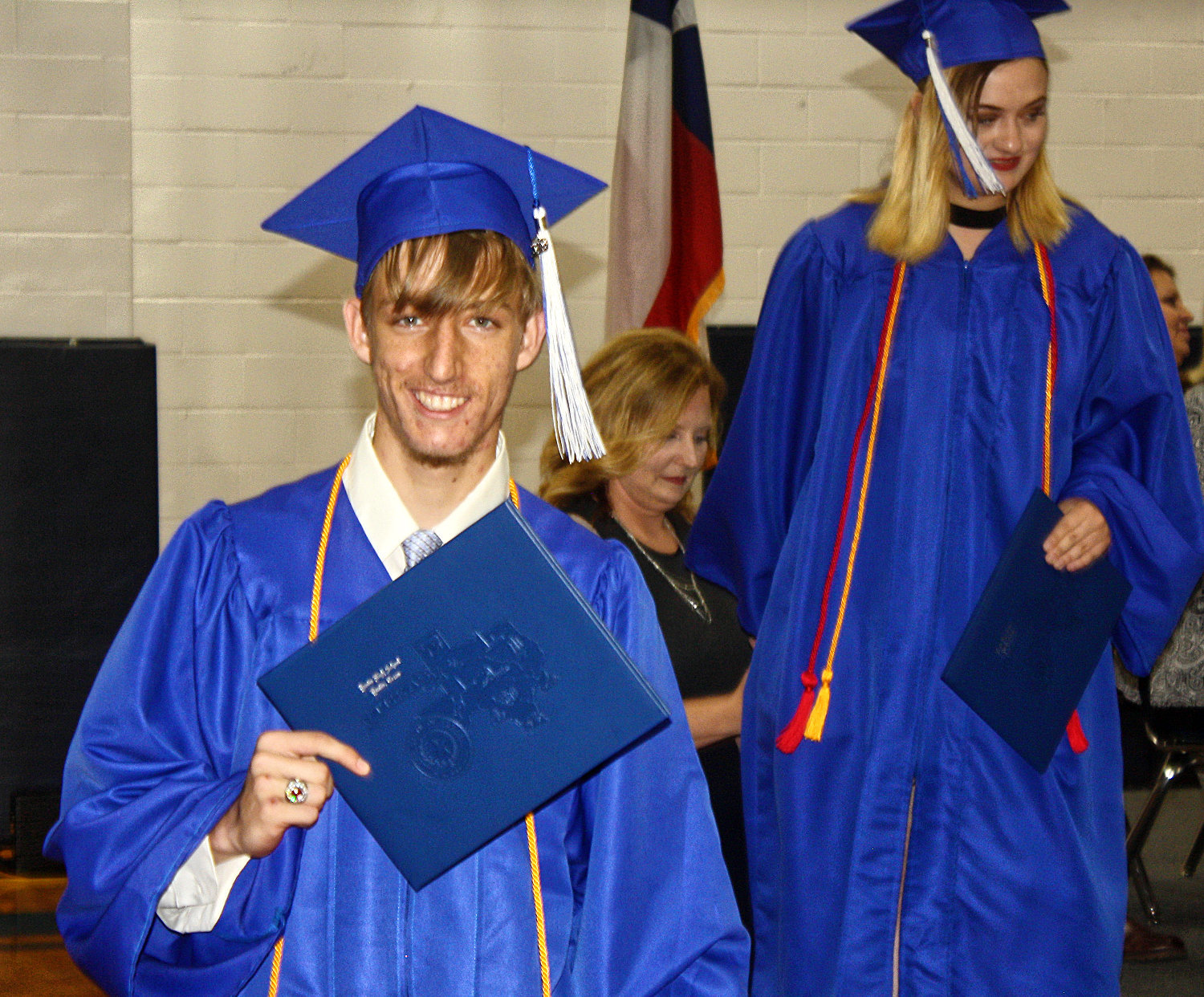 Yantis 2019 graduate Zachary Shearer smiles after walking off the stage with his diploma in hand.