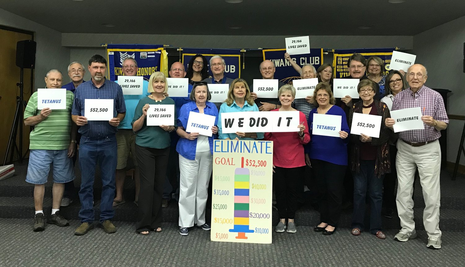 Mineola Kiwanis Club members celebrate reaching their goal for the international Eliminate Project. (Courtesy photo)