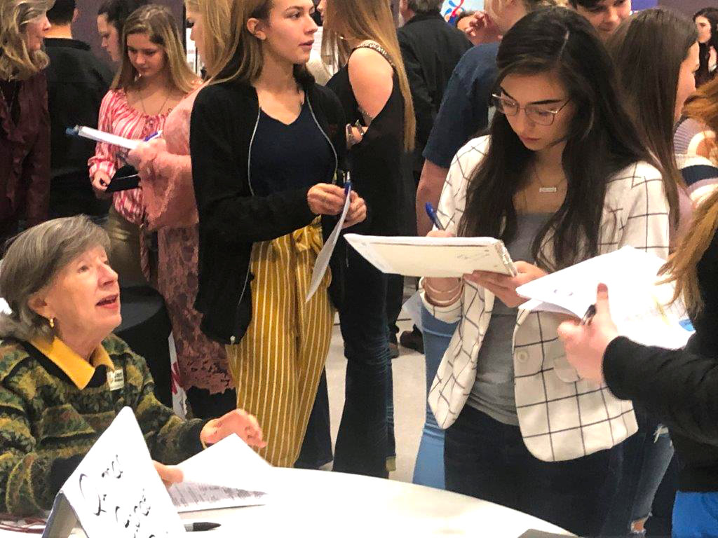 Kayla Munger (right) signs up at the Quitman Garden Club booth at the Senior Scholarship Night at Lake Fork Baptist Church. Garden club member Jan Whitlock (seated) was on hand to answer questions and sign up students.