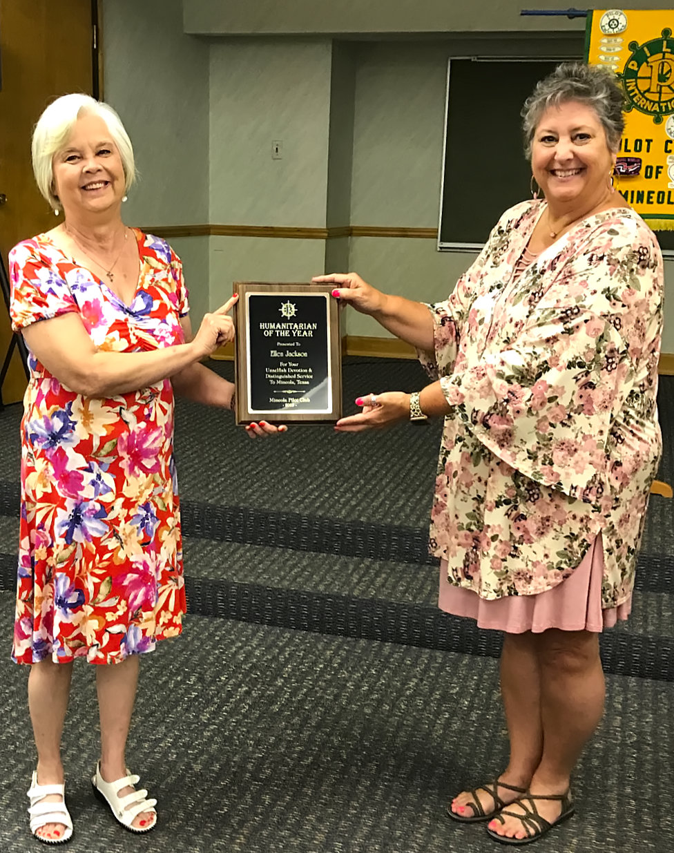 Ellen Jackson, left,  was named the humanitarian of the year by the Mineola Pilot Club. Club President Loraine Eppsa presented the award at the club’s annual banquet recently. It was to be presented at the annual chamber banquet in March, which had to be canceled.