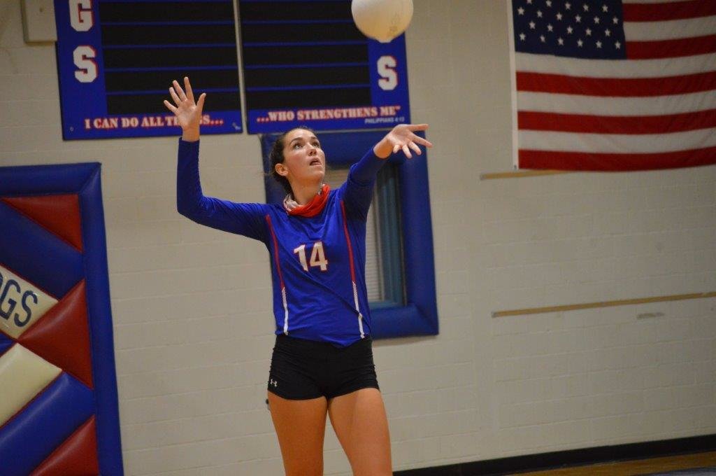Ava Burroughs gets ready to serve one of her five aces in Quitman’s win over Ore City. (Monitor photo by Larry Tucker)