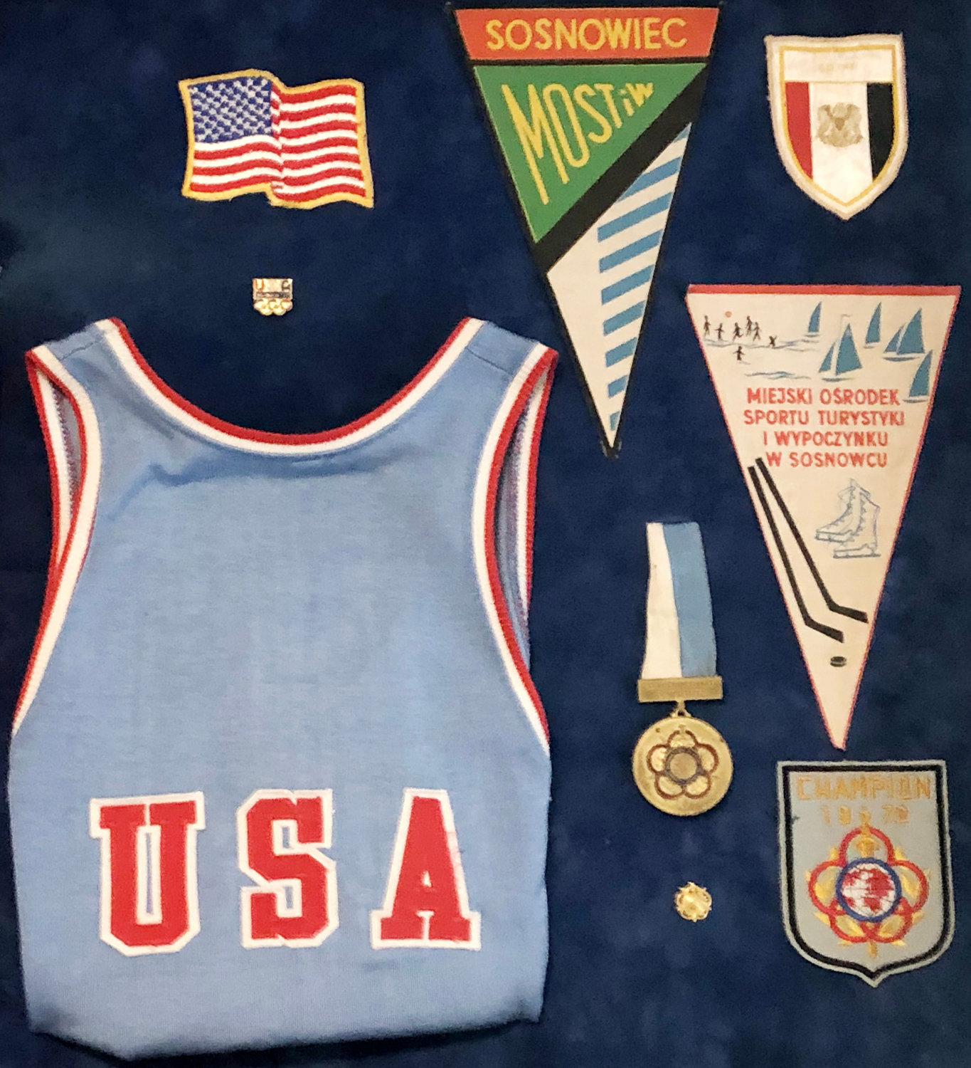 Memorabilia from some of Nick Wells’ travels as he fought for the United States in international competition.