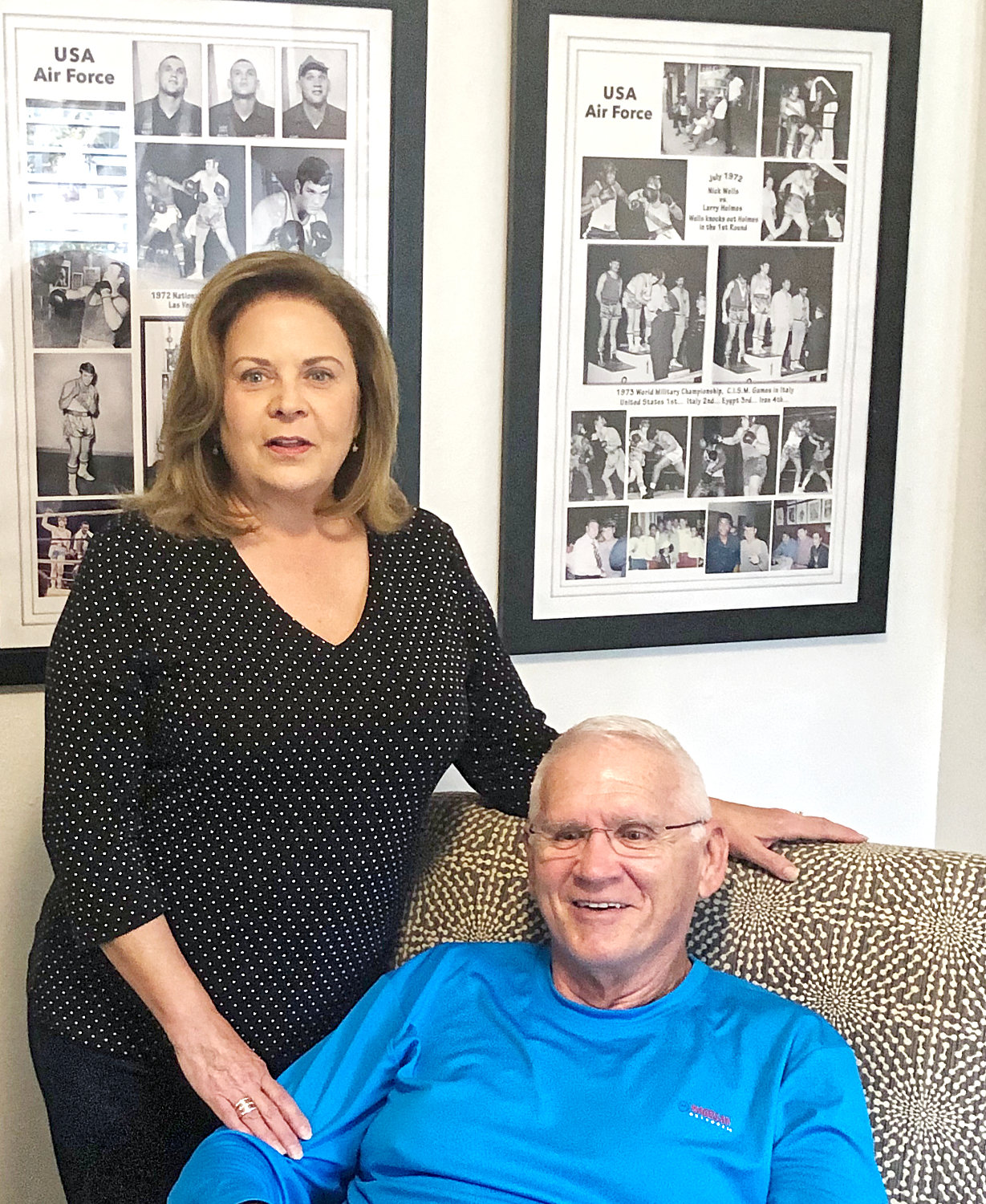 Nick and Denise Wells in their Mineola home, dedicated to the former boxer’s travels and success in and out of the ring.