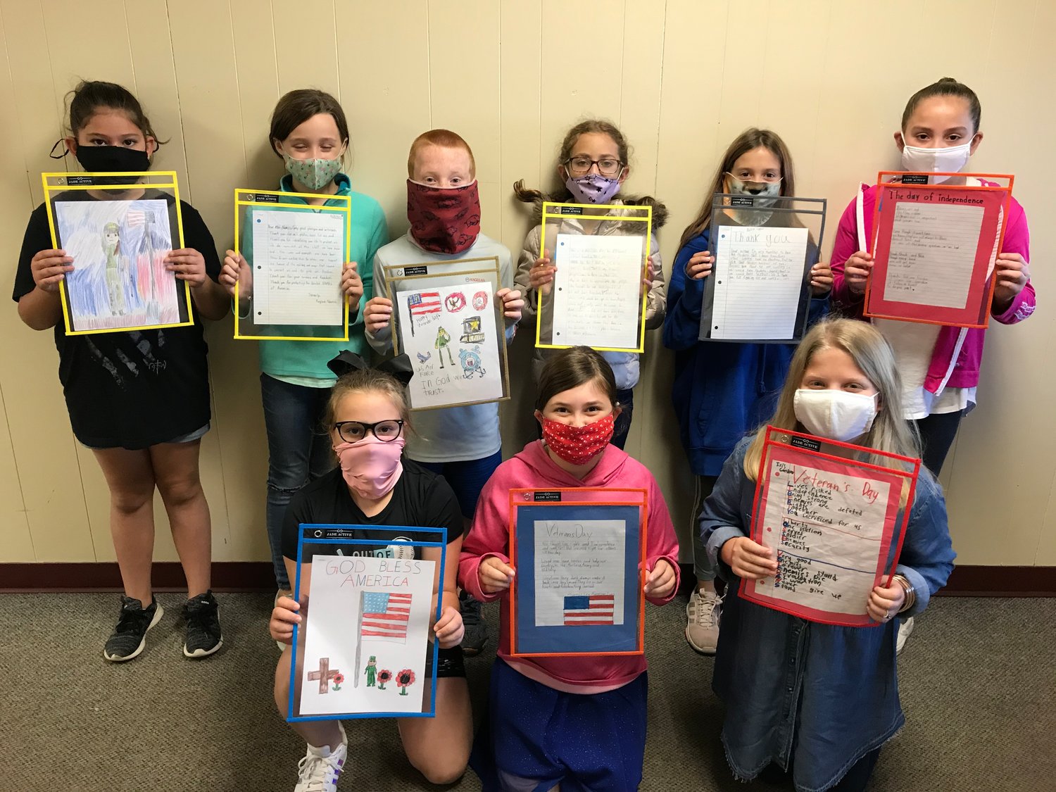 Winners of the Mineola Pilot Club patriotic challenge were, back from left, Lilah Dougherty, Kaylee Nance, J.D. McGough, Julieane Hoff, Bella Exner and Paislee Hall; and, front, Kinsler Bowker, Callee White and Iris Goodson. (Courtesy photo)