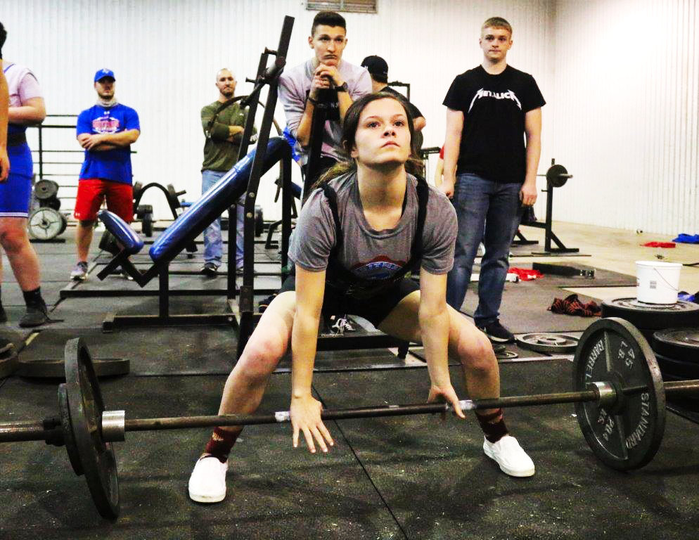 Quitman’s Rhiana Bradshaw gets ready for her dead lift at last Thursday’s meet in Quitman.