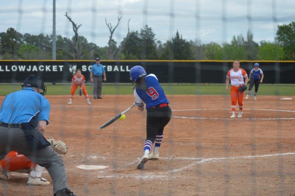 Quitman Lady Bulldog Alexis O’Neals hits a single to left field in Friday’s 13-0 win at Mineola.