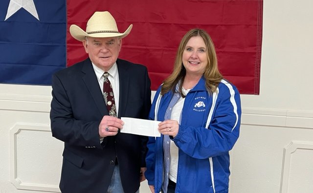 Flora Masonic Lodge 119 of Quitman recently raised just over $4,500 at their annual fish fry. The December 2022 event was a benefit for Quitman Christmas Sharing Plus. From left, Lodge Master, Charlie Couser presented the check to Christmas Sharing Plus Chairwoman Michelle Dobbs on Jan. 19. Annually, the lodge contributes to the Christmas drive, which in 2022 served 433 people in 188 households.