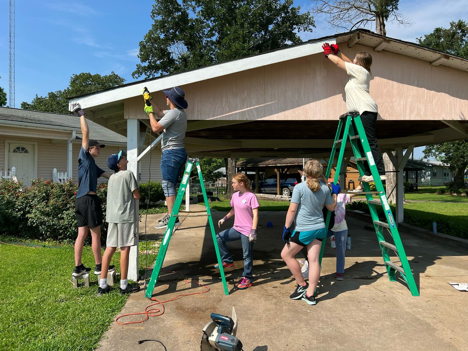 Among the home improvement projects undertaken by the UM Army in Wood County last week was repair work on this carport in Alba.