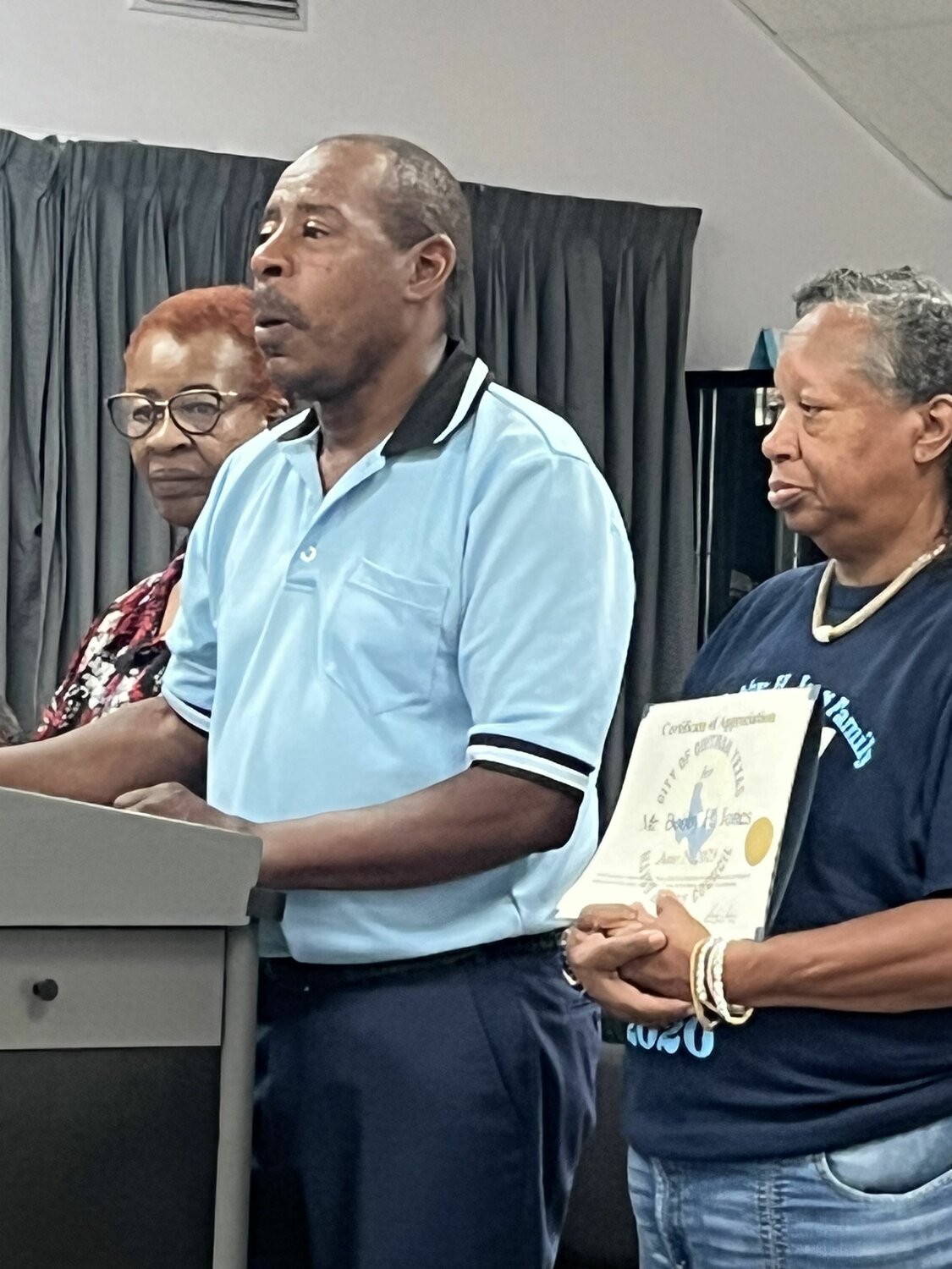 Alvin Jones (center) is flanked by his sister Barbara Berry (left) and step-mother Nita Jones (right) as he addresses the Quitman City Council on the recognition of his father, the late Rev. Bobby Jones who was awarded a certificate of appreciation from the City of Quitman at last Thursday’s city council meeting.