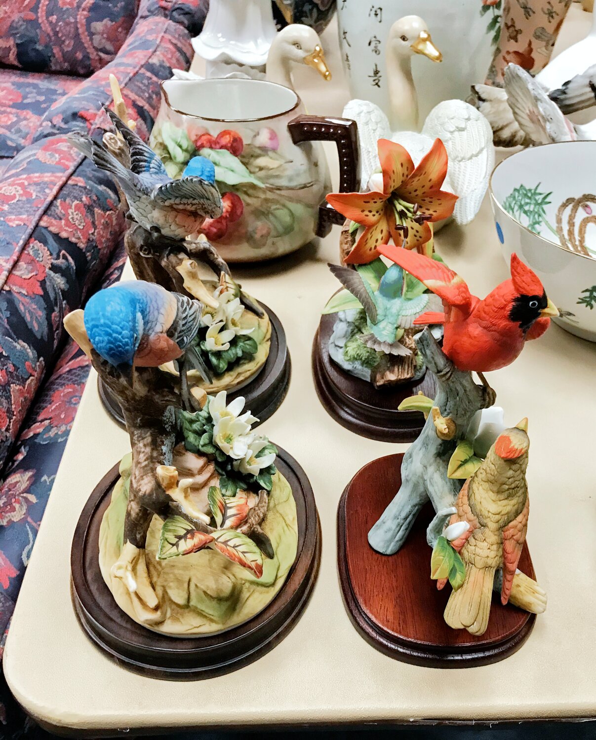 Colorful bird figurines will be among the items to be sold during the Mineola Civic Center’s estate sale Thursday through Saturday.
