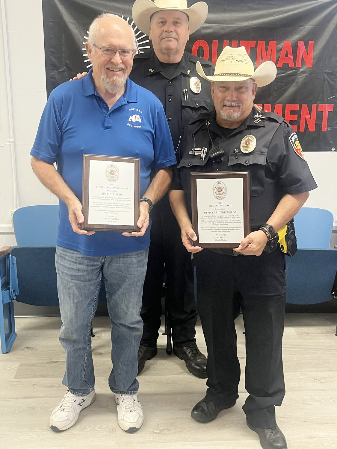 Quitman Police Department Life-Saving Award winners were given plaques by Chief John Farmer last Thursday afternoon. They are Jim Pritchard (left) and Officer Victor Taylor (right).