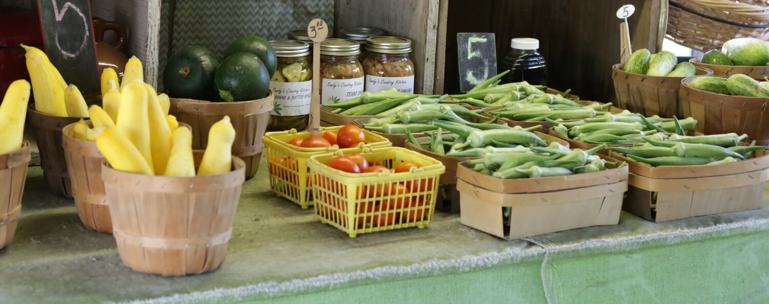 Johnston grows plenty of summer vegetables such as squash, tomatoes, okra and cucumbers.