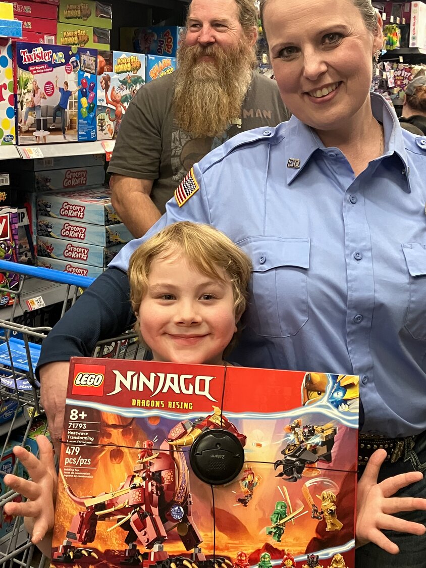 Fireman Jackson with the Hawkins Fire Department chooses Lego sets with Zane Hill.