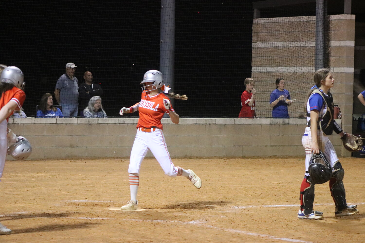 Quitman catcher Larkin Spears waits for a throw as Mineola scores another run in last week’s 11-1 district victory by the Lady Jackets.