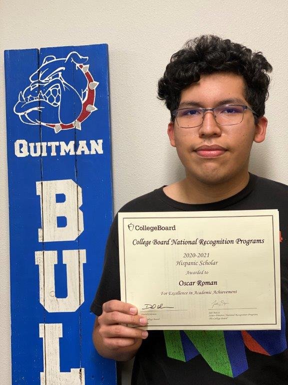 Oscar Roman, senior at Quitman High School, shows off his recognition certificate from the national College Board.