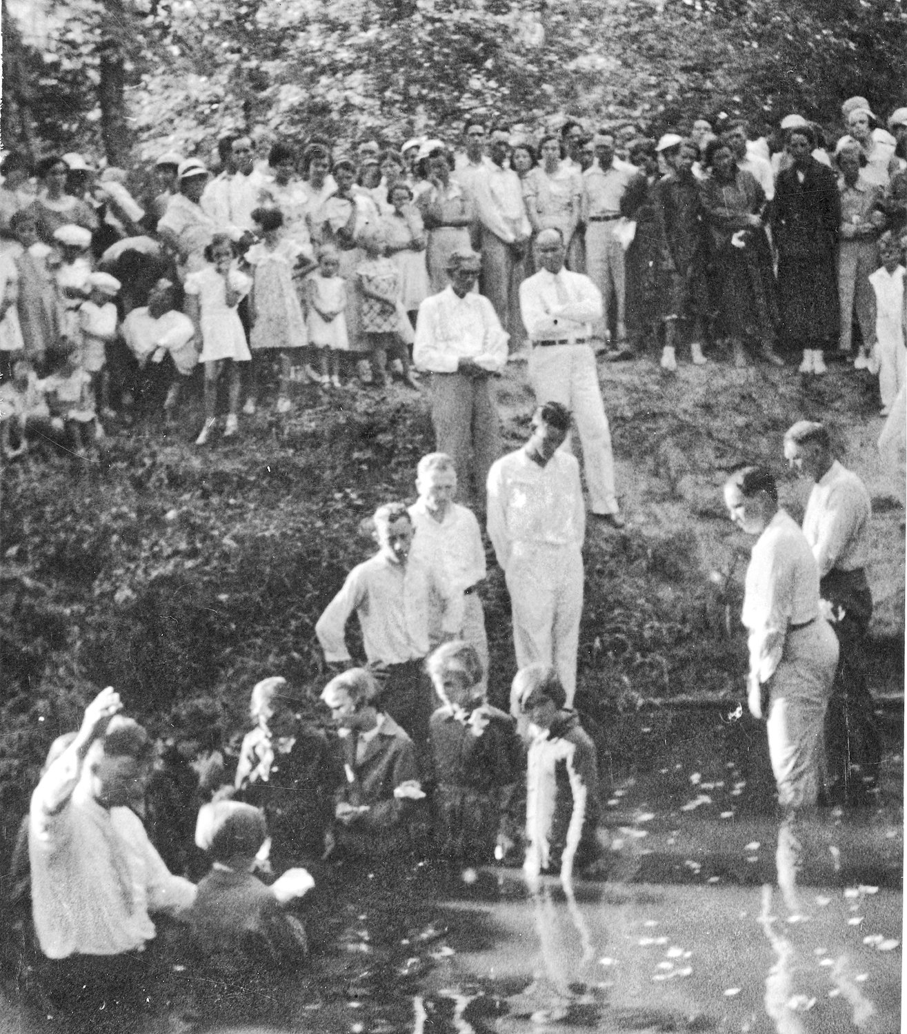 The photograph “Baptism near Mineola - Summer 1935” is provided courtesy of the Library of Congress.
