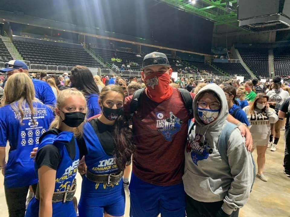 Quitman power lifters competing in state competition were (left to right) Kaitlyn Barnett, Brooklyn Marcee, Coach Ryan Turney and Bailey Hughes.