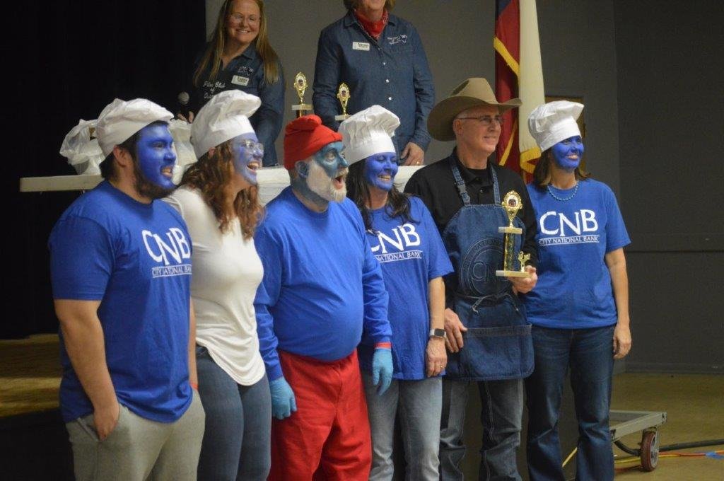 The City National Bank of Quitman’s Blue Smurfs won the third place trophy in the booth competition at the annual Qutiman Pilot Club’s annual chili cook-off last Friday at Carroll Greene Civic Center in Quitman.