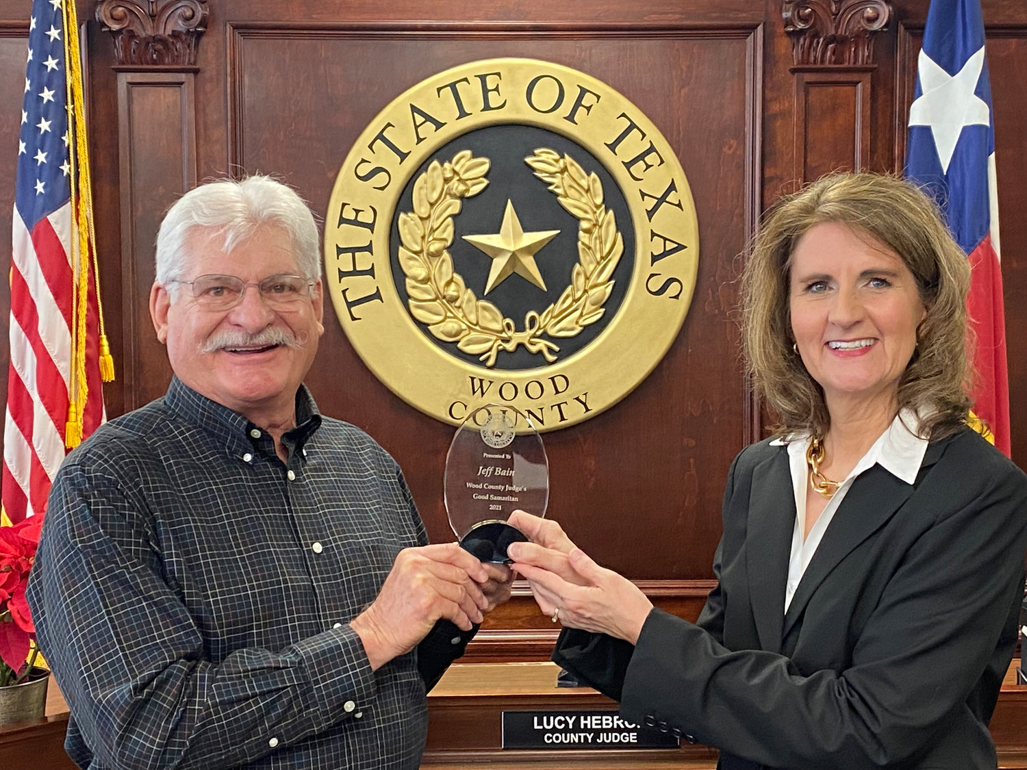 Jeff Bain is presented the first Wood County Judge’s Good Samaritan Award by Judge Lucy Hebron.