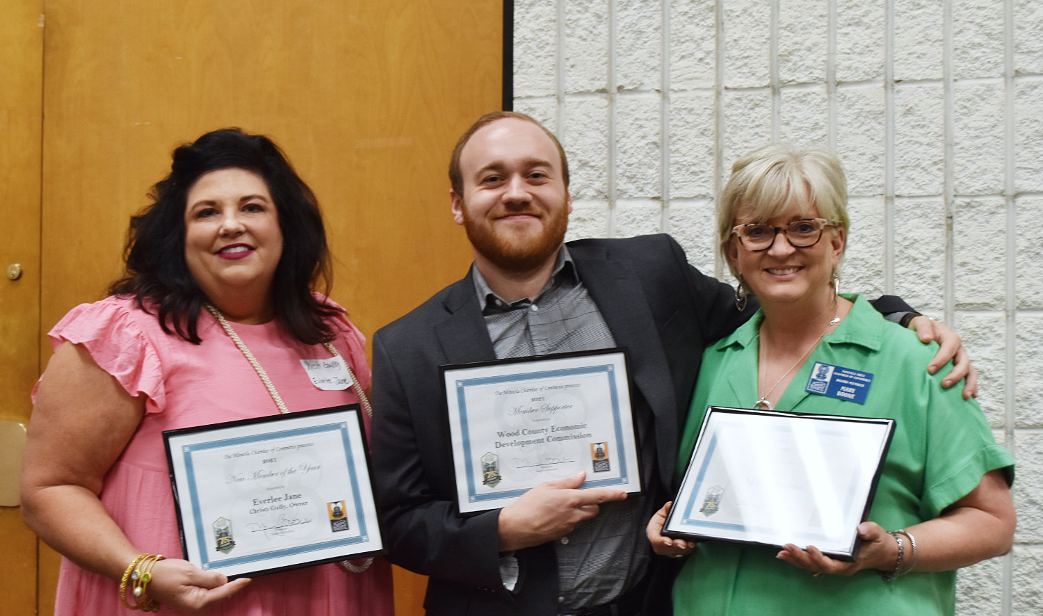 Mineola Chamber of Commerce award winners recognized Friday included, from left, Christi Gully, Christophe Trahan and Mary Boone.