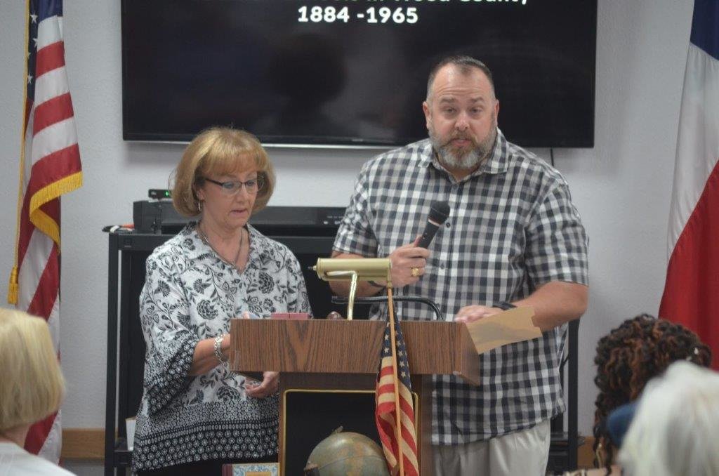 Sheree Mize gave a history of her great-grandfather, J.U. Searcy, who was the first superintendent of Wood County Common Schools. Also pictured is her son, Cody Mize, who read a letter from Searcy to Ulna McWhorter's grandmother.