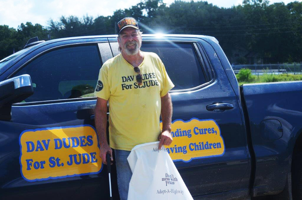 Bob Sistok collects trash for cash for the children at St. Jude Hospital and Research Center. He has been picking up trash along Hwy. 17 from FM 515 to Alba. He will next be picking up trash on Hwy. 69 from Alba to Emory.