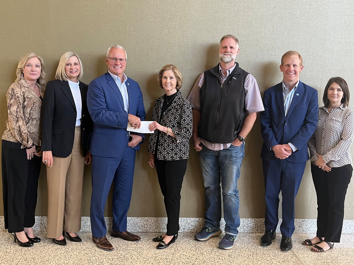 Origin Bank made a donation to Quitman Christmas Sharing, Plus recently. Pictured are, from left, Kelly Harris, Kori Sirman, Drake Mills-chairman, president of CEO of Origin, Beth Merlin, Dave Simpkins and Missy Kirby.