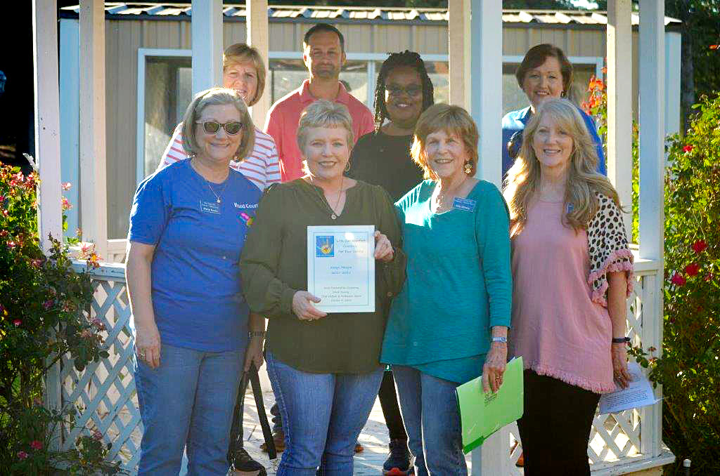 Honoree Karyn Margos with child welfare board members.