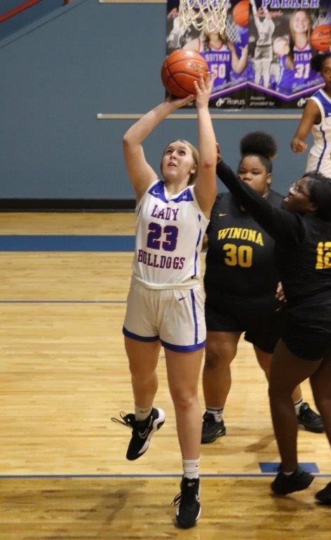 Lady Bulldog Annabelle Popek scores against Winona in Quitman’s 58-1
win last week at home.