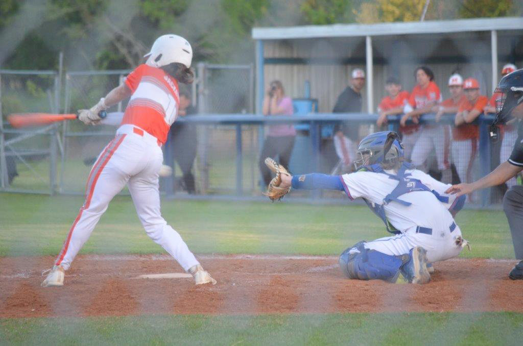 Mineola’s Dalton Hamlin (1) fouls off a pitch as Quitman catcher Brandon Hayes prepares to make a play on the pitch.