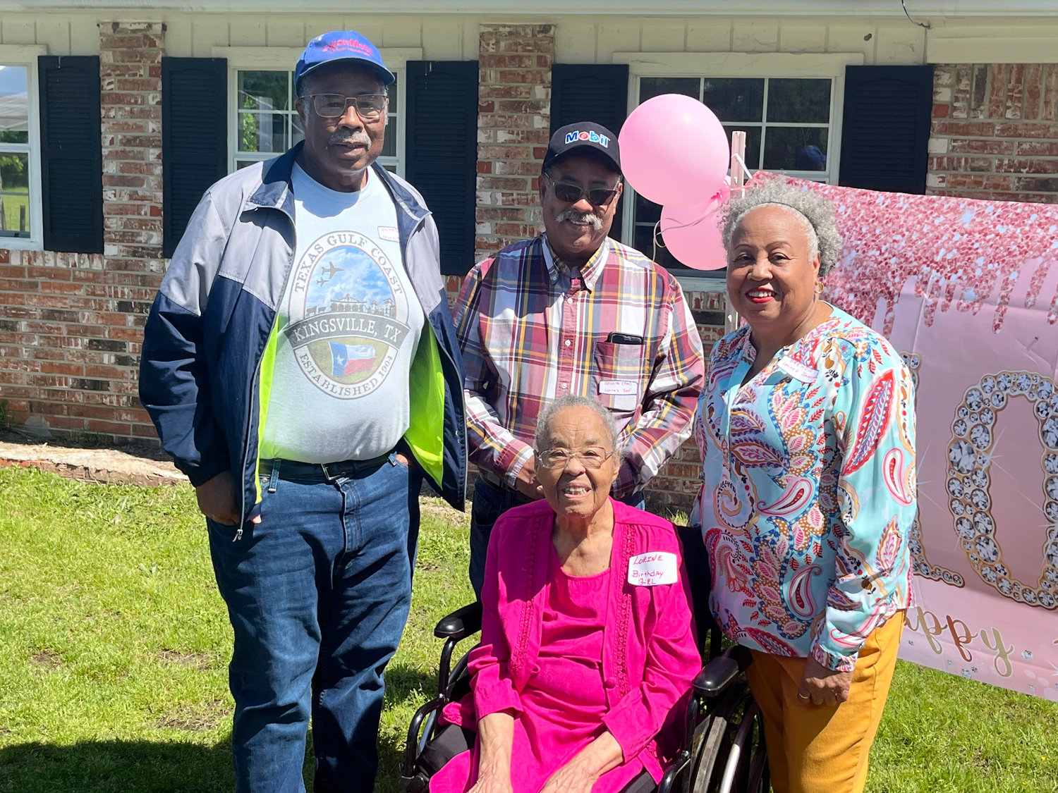 Lorine Hunter, seated, celebrated her 100th birthday with family and friends at her home north of Quitman, including her children, from left, Walter Hunter, Kennith Hunter and Brenda Hunter.