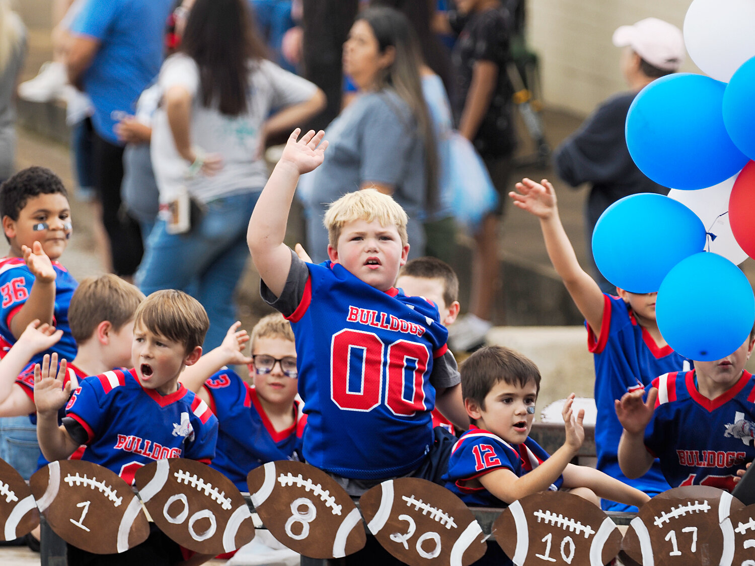 Football players of all ages got to take part in the procession westward up Goode St. [see more sights & buy Bulldogs prints]
